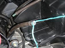 Plugged hose with string attached - click for larger image